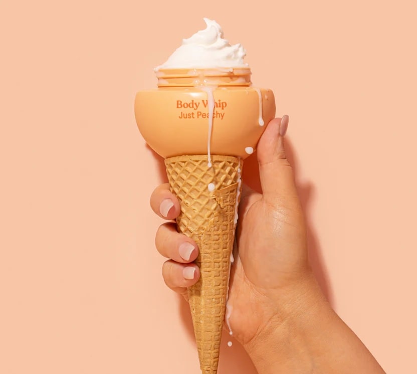 Just Peachy Body Whip on an ice cream cone. (For the article: Don't Let Dry Air Ruin Your Skin. Use These Clever Tricks for Hydrating During a Long Flight)